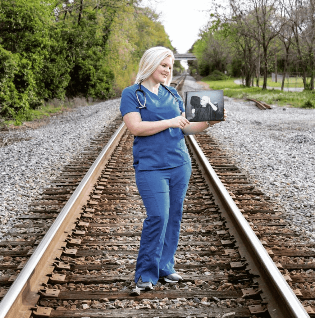 nurse on railroad tracks