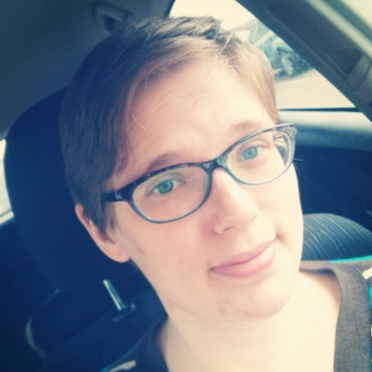 Melissa sitting in her car