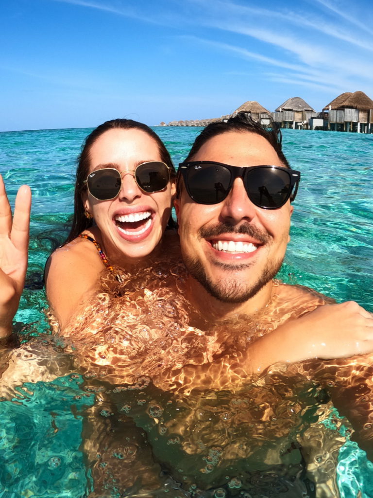 Emmanuel S. and wife Jessica in the water