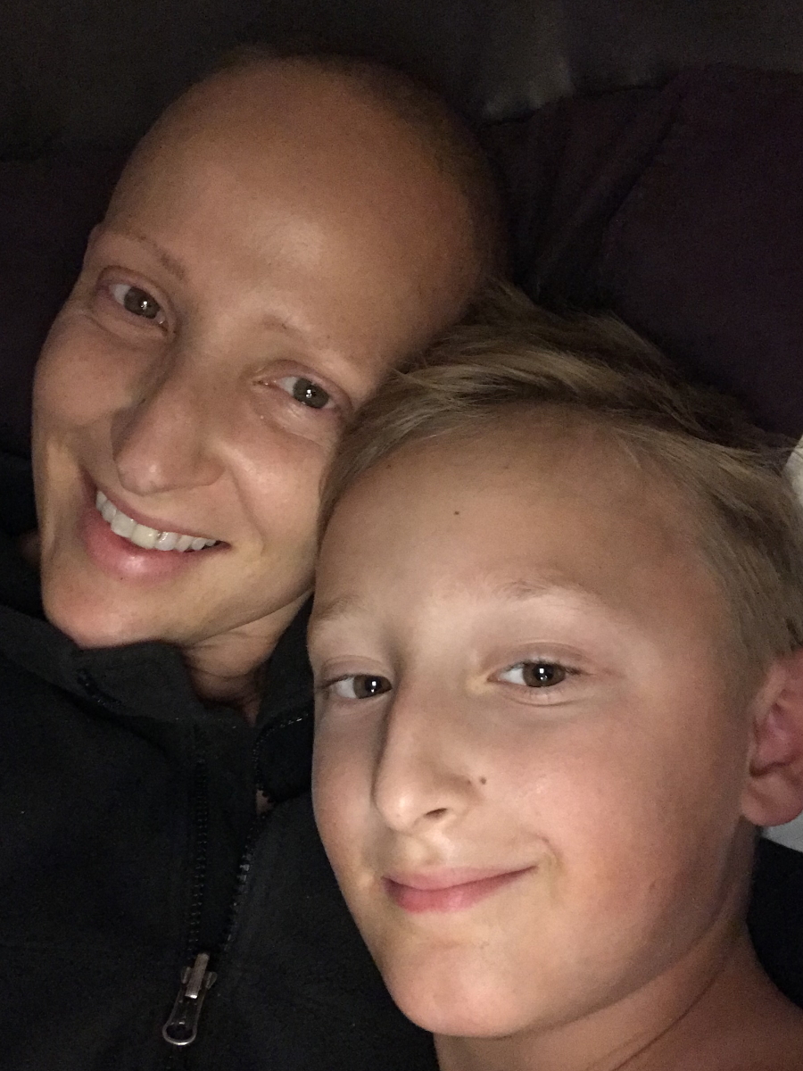 Samantha S. buzzed hair with son