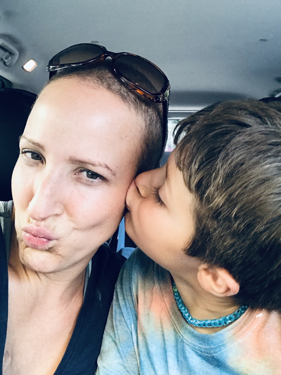 Samantha S. buzzed hair with son