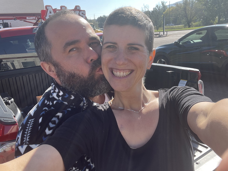 Anna T. and husband Joe back of pickup truck