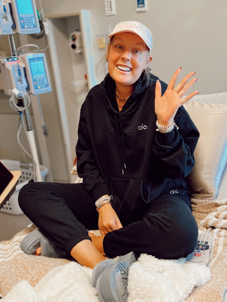 Paige C. on hospital bed