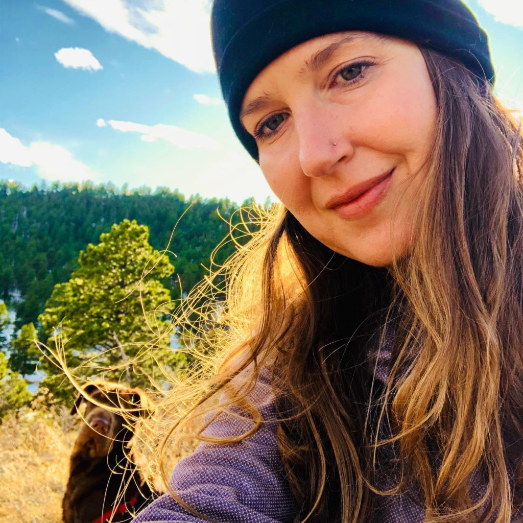 Bethany W. outdoors with dog