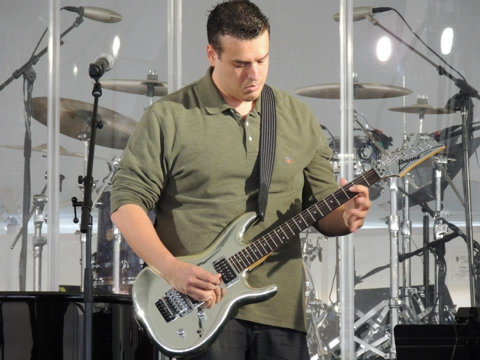 Dr. Josh Richter playing guitar