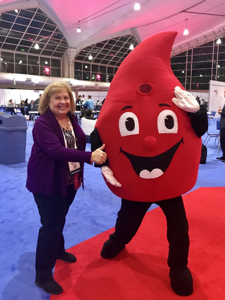 Cindy Chmielewski with Red, ASH mascot