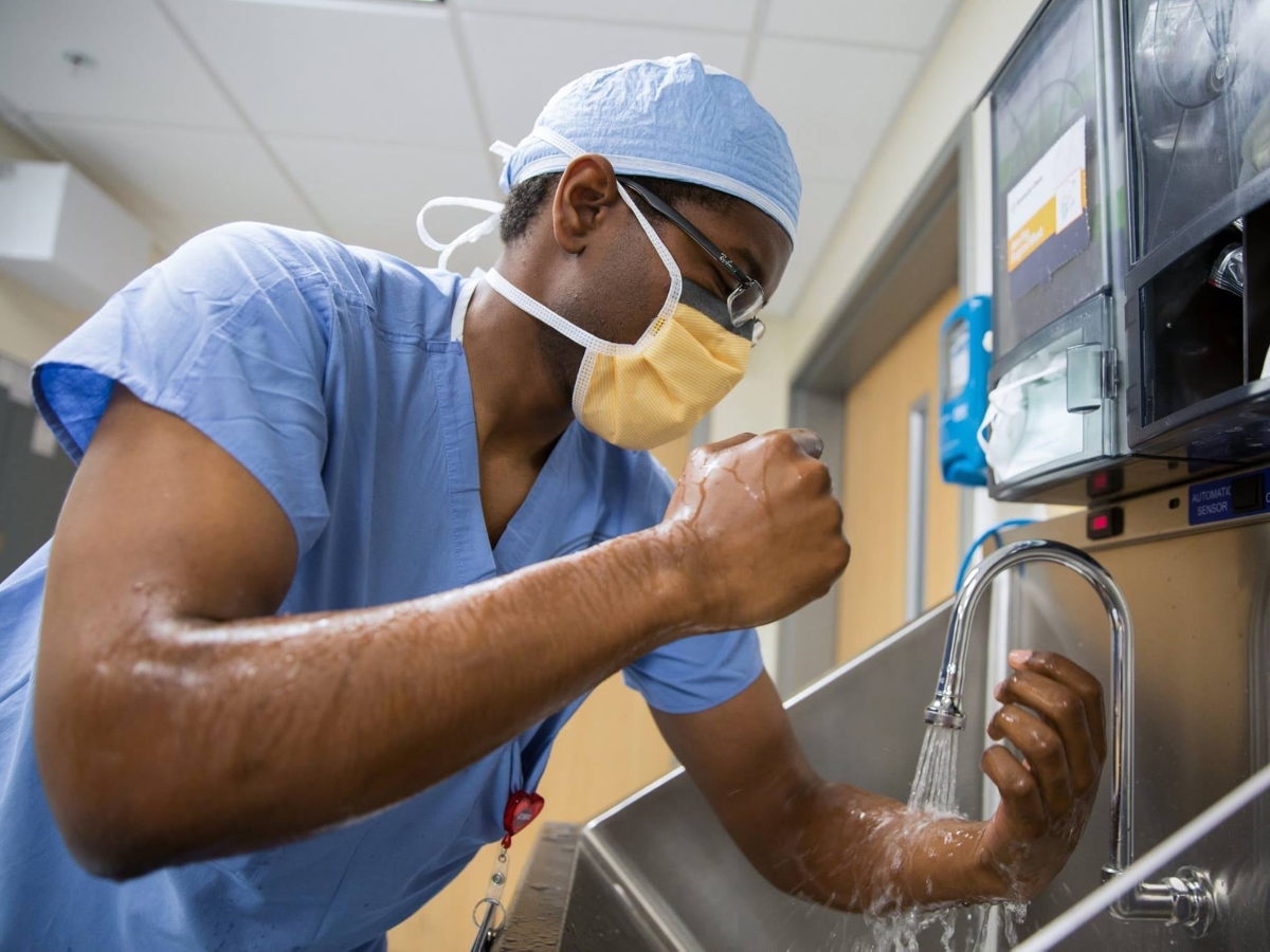 Dr. Samuel Washington scrubbing in