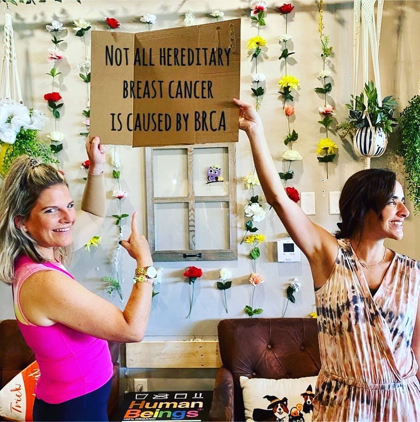 Lainie J. holding BRCA sign