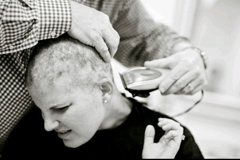 Lainie J. hair being shaved off