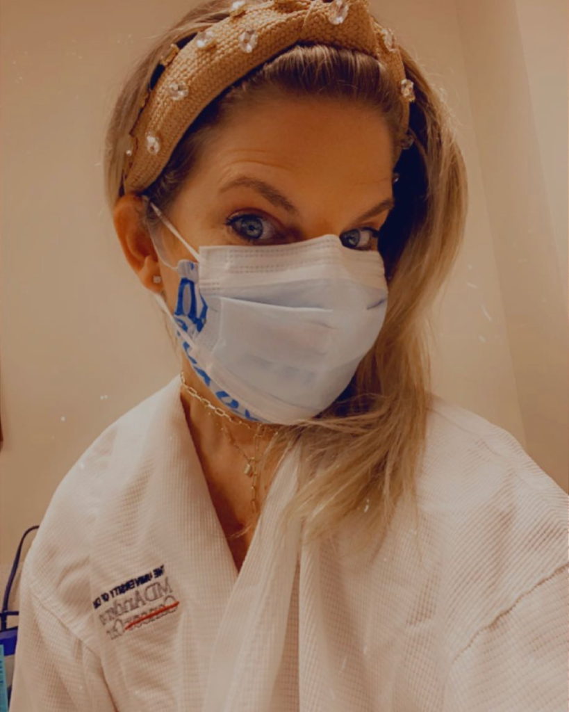 Lainie J. in MD Anderson robe