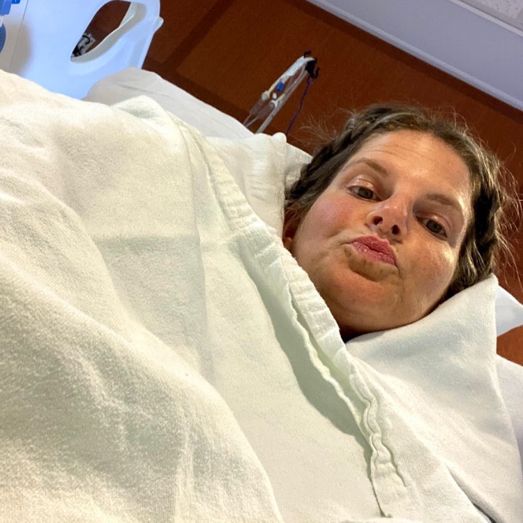 Lainie J. in hospital bed