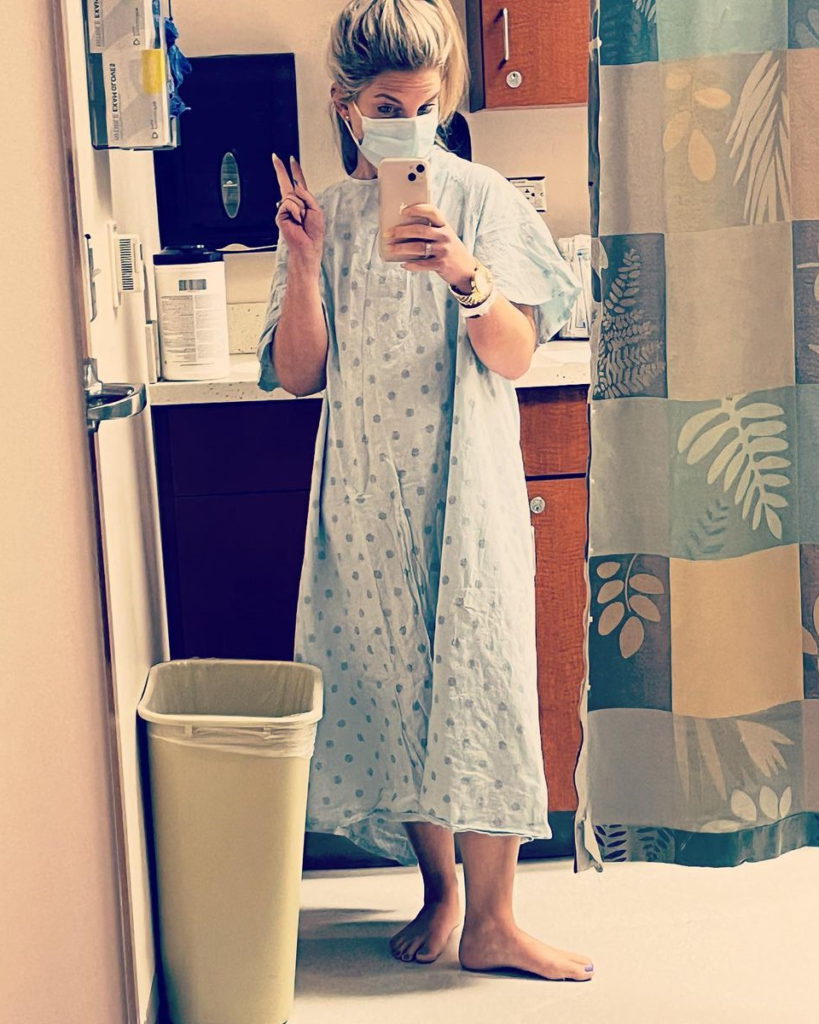 Lainie J. in hospital gown