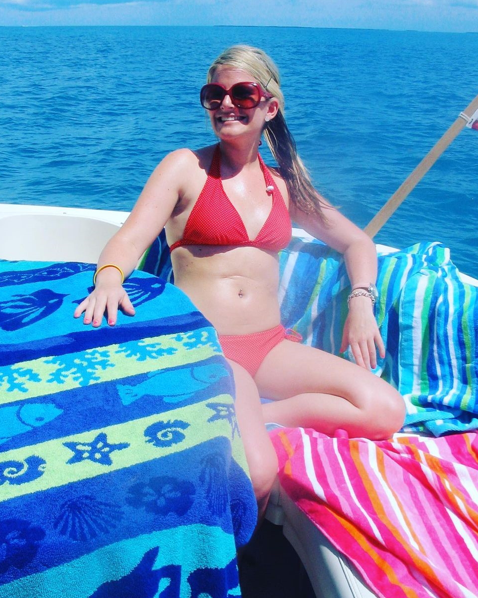 Lainie J. on a boat