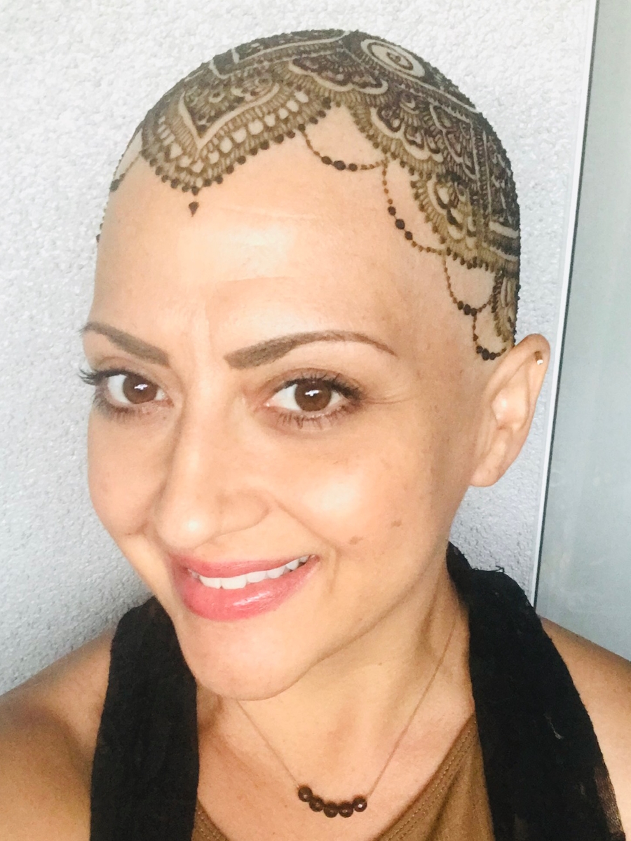 Renee F. head henna tattoo
