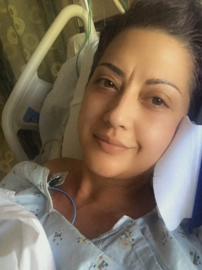 Renee F. in hospital bed