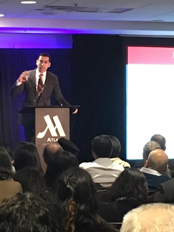 Dr. Chadi Nabhan speaking in front of audience