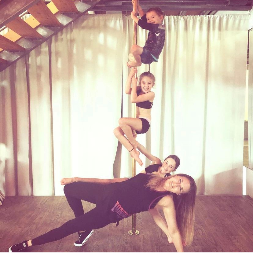 Nicky instructing pole dancing as a way to stay healthy and rebuild muscle
