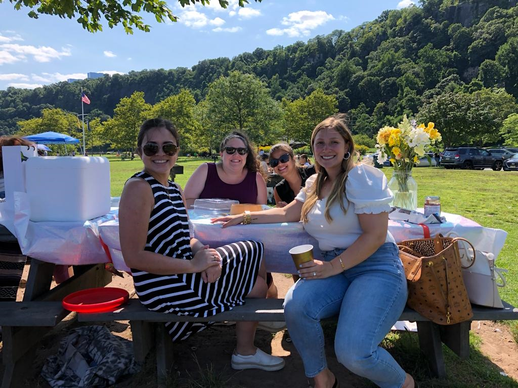 Stephanie V. with friends outdoors
